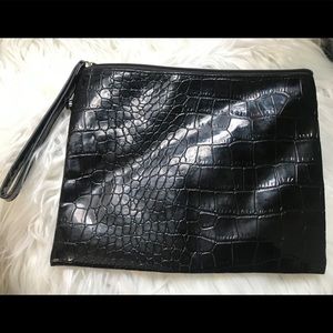 Cute decent size black pouch